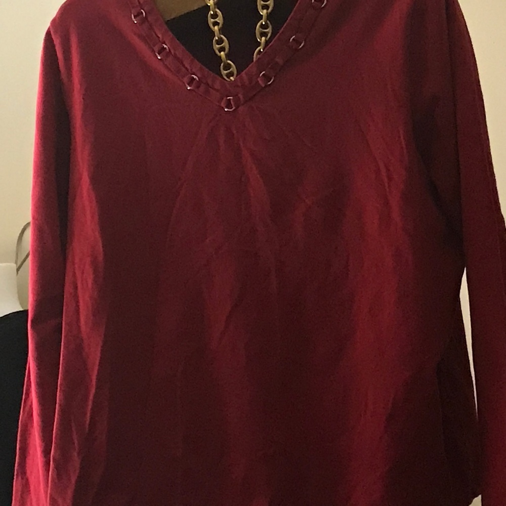 Red V-neck longsleeve pullover top